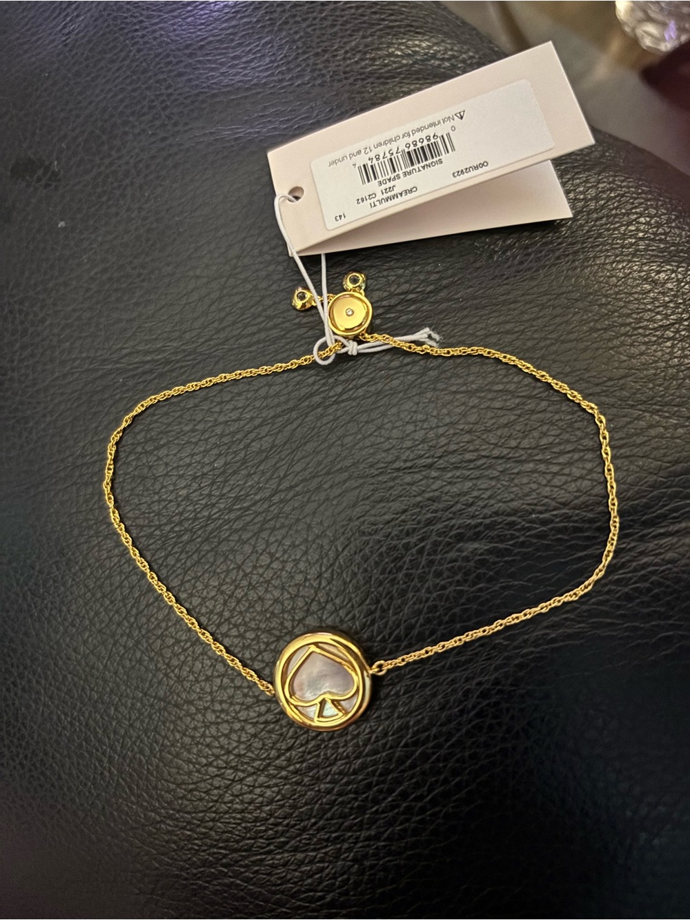 NWT kate spade gold spade circle pendant bracelet
